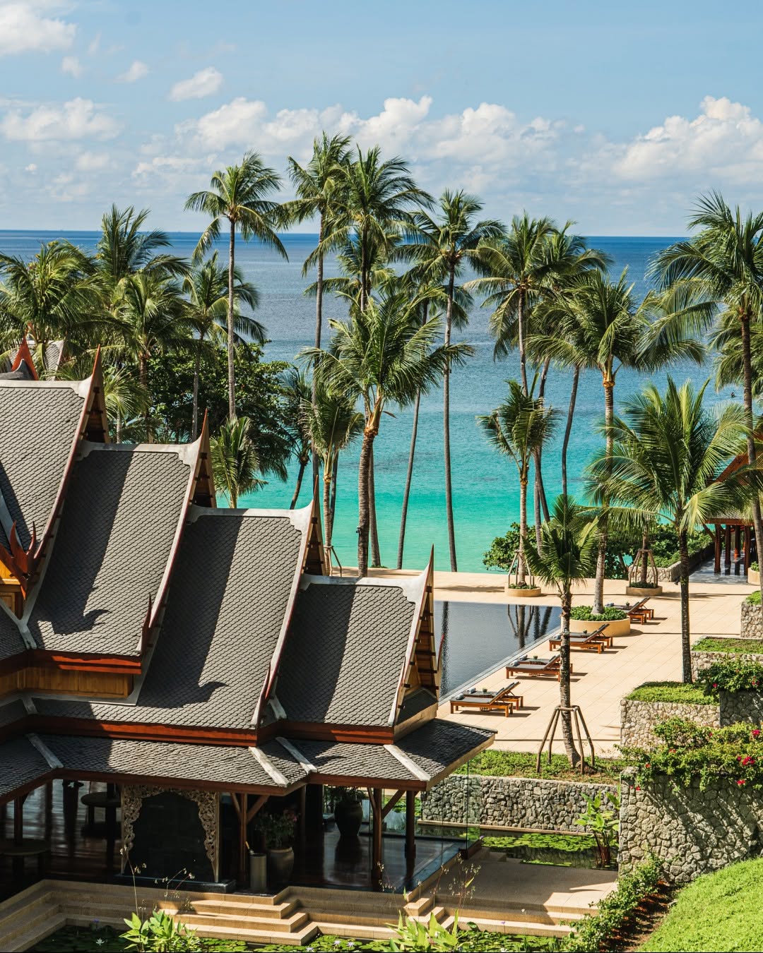 Traditional Thai pavilion rooftops at Amanpuri overlooking the Andaman Sea