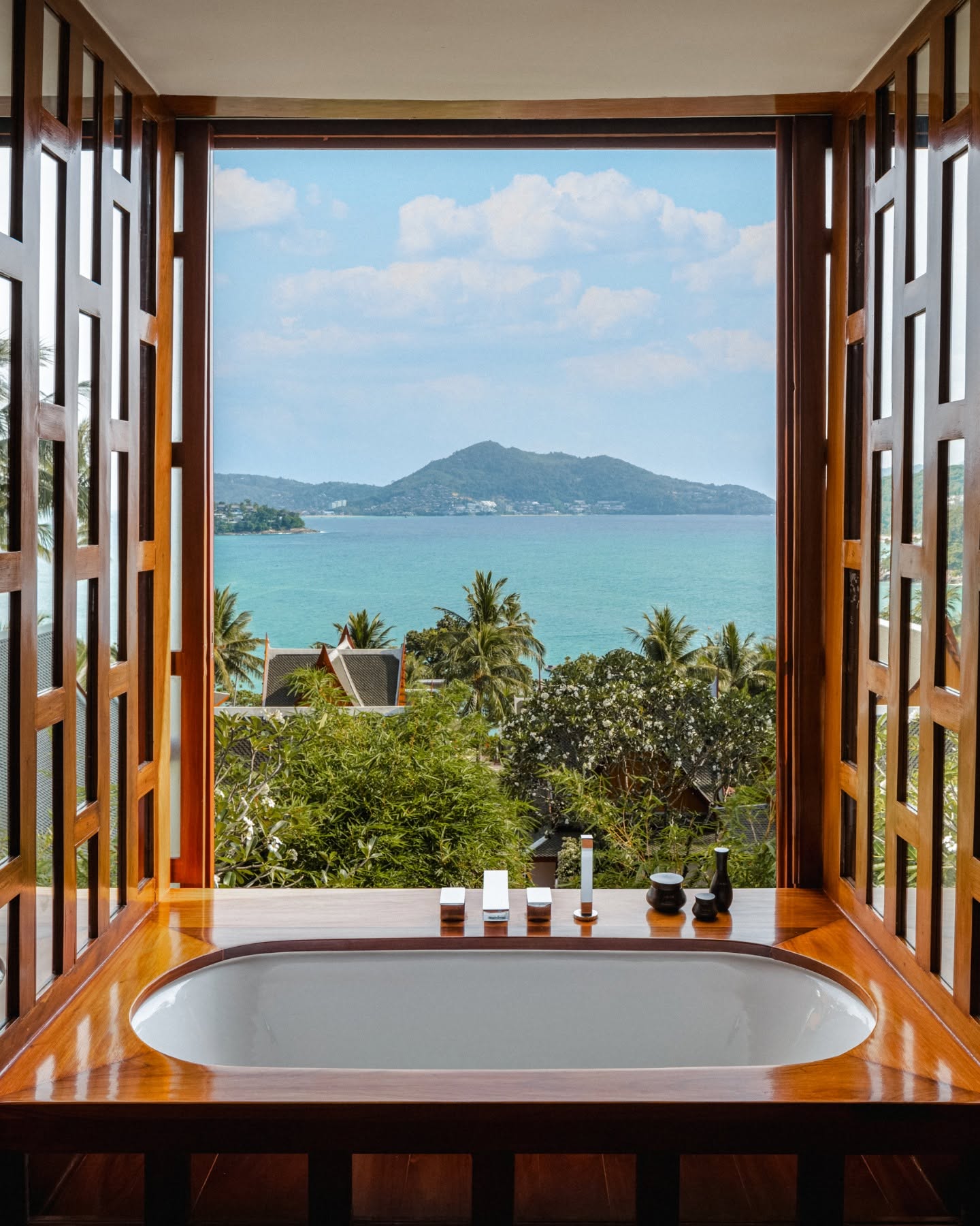 A guest bathroom at Amanpuri with a panoramic view over the bay